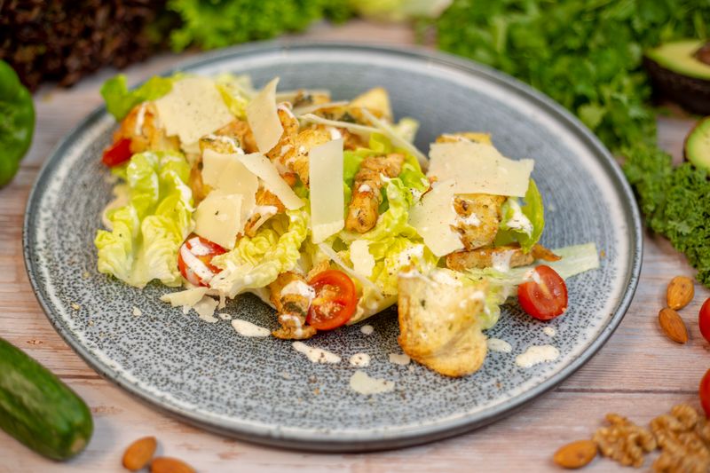 Fresh Caesar salad with romaine, croutons and parmesan
