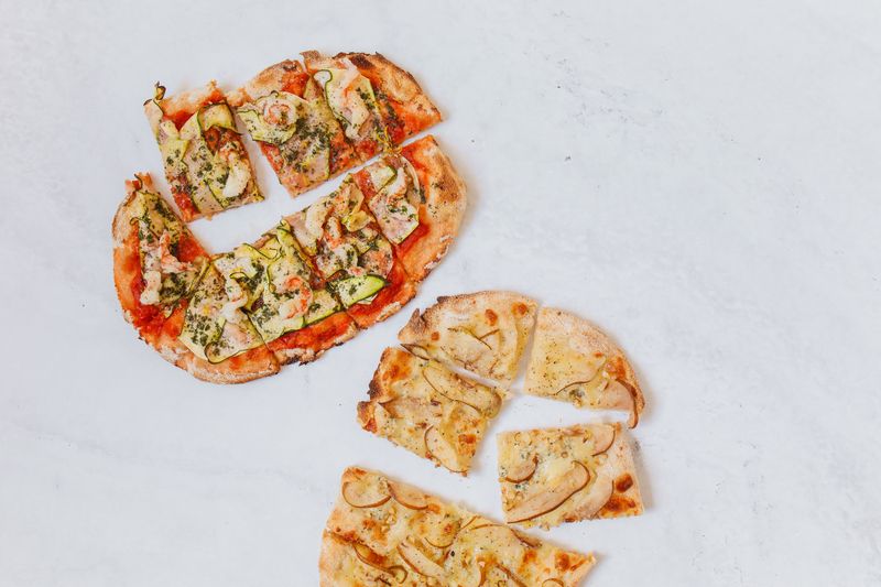 Gourmet seafood pizza with shrimp, scallops and lemon cream sauce